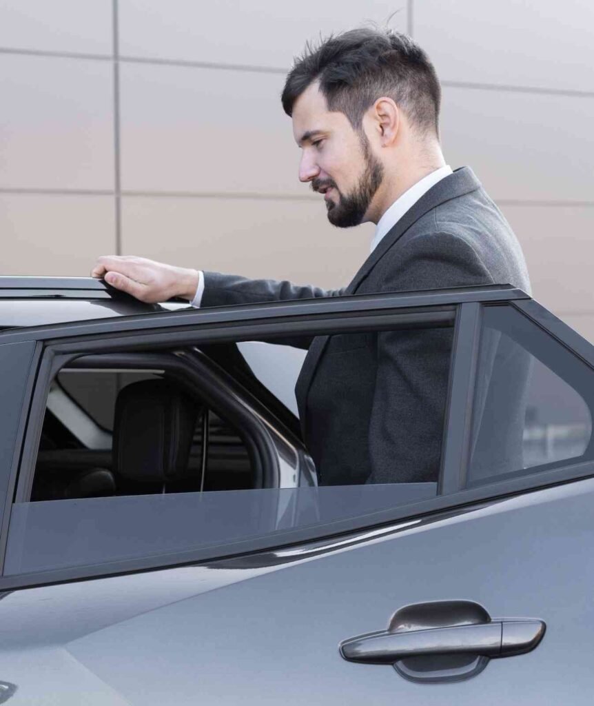 driver-with-opened-car-door