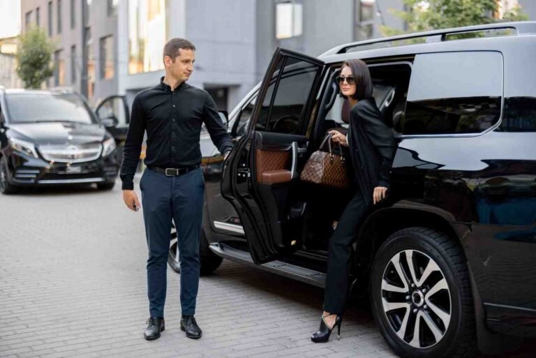 male-driver-helps-business-lady-get-out-car-11